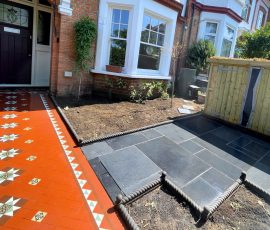 Black Slate Slabs With Mosaic Path